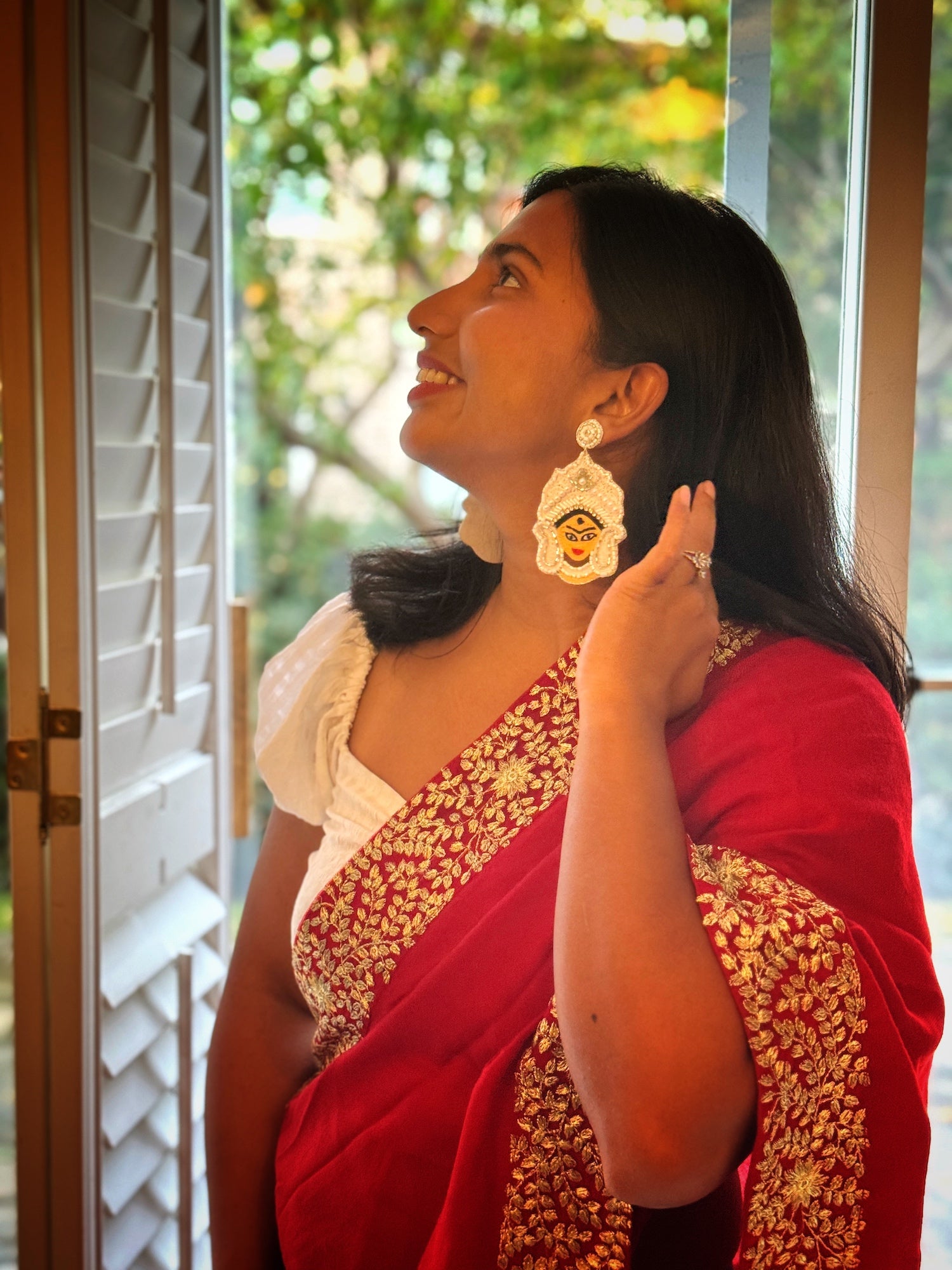Genelia Deshmukh chooses a red organza saree to promote 